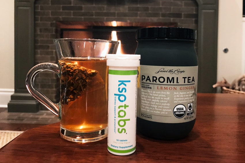 A recipe for a Lime KSP tab and tea next to a fire.