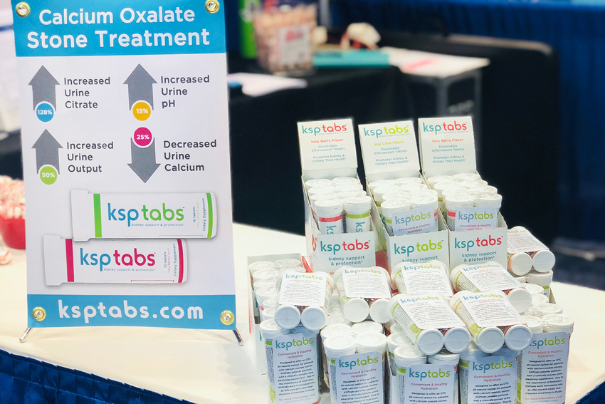 KSPtab trial packs on a table with a sign giving the benefits of KSP.